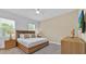 Bedroom with neutral colors, carpet, and ceiling fan at 1428 Reunion Blvd, Kissimmee, FL 34747