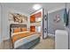Modern bedroom with a custom bunk bed and accents, offering a unique and stylish space at 1428 Reunion Blvd, Kissimmee, FL 34747