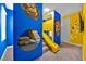 Whimsical room with unique bunk beds featuring a slide, and playful decorations at 1428 Reunion Blvd, Kissimmee, FL 34747