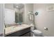 Bathroom featuring granite counters, vanity, and step-in shower at 1631 Nina Dr, Davenport, FL 33837