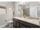 Bathroom featuring double sinks with granite counters and tile floors at 1631 Nina Dr, Davenport, FL 33837