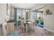 Bright dining area with sliding glass doors leading to outdoor space at 1631 Nina Dr, Davenport, FL 33837