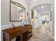 Spacious foyer featuring travertine floors and view to dining area at 1631 Nina Dr, Davenport, FL 33837