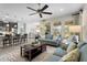 Open-concept living space with bar seating and great natural light at 1631 Nina Dr, Davenport, FL 33837