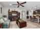 Open-concept living and dining space with bar seating at 1631 Nina Dr, Davenport, FL 33837