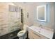 Modern bathroom with a glass-enclosed shower, sleek vanity, and an illuminated mirror at 202 Acadia Ter, Kissimmee, FL 34747