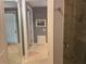 Modern bathroom featuring a walk-in shower with glass door and neutral paint at 202 Acadia Ter, Kissimmee, FL 34747