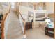 Inviting foyer showcasing staircase and an open floor plan leading to the living area at 206 Norfolk Pl, Celebration, FL 34747