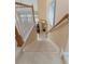 Carpeted staircase leading to the lower level of the home at 206 Norfolk Pl, Celebration, FL 34747
