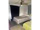 Bedroom features a ceiling fan and is furnished with a bed at 2071 Liston Ct, Orlando, FL 32811