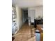 Hallway features tile flooring, built-in shelving, and access to several rooms in the home at 2071 Liston Ct, Orlando, FL 32811