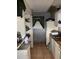 Kitchen with basic appliances and shelving at 2071 Liston Ct, Orlando, FL 32811