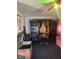 A living room showcasing dark-toned furniture, complemented by curtains and a vintage trunk at 2071 Liston Ct, Orlando, FL 32811