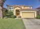 Charming two-story home with well-maintained lawn and landscaping at 219 Rosso Dr, Davenport, FL 33837