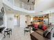 Open floor plan with seamless flow between living room, kitchen, and dining area, perfect for entertaining at 219 Rosso Dr, Davenport, FL 33837