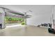 Spacious garage with freshly painted white walls and abundant storage space at 2287 Park Maitland Ct, Maitland, FL 32751