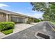 Attached garages with open doors provide ample parking and storage at 2287 Park Maitland Ct, Maitland, FL 32751