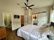 Spacious main bedroom featuring an ensuite bathroom with modern fixtures and barn door at 2287 Park Maitland Ct, Maitland, FL 32751