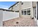 Private patio area with brick pavers and white fence at 2287 Park Maitland Ct, Maitland, FL 32751