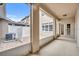 View of the outdoor patio showcasing its brickwork, and fence separating an AC unit at 2287 Park Maitland Ct, Maitland, FL 32751