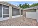 A lovely red brick patio with access to the home's interior through a screened door at 2287 Park Maitland Ct, Maitland, FL 32751