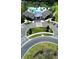 Aerial view of the community center with lush landscaping, walkways, and convenient parking at 2386 Rama Dr, Kissimmee, FL 34746