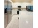 Modern kitchen features white cabinets, stainless steel appliances, and a marble backsplash at 2386 Rama Dr, Kissimmee, FL 34746