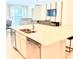 Kitchen area featuring stainless appliances and island with sink and dishwasher at 2386 Rama Dr, Kissimmee, FL 34746