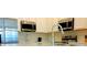 Close up of updated kitchen appliances and bright white cabinets at 2386 Rama Dr, Kissimmee, FL 34746