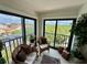 The outdoor balcony seating area overlooks a treelined view at 265 E Canton Ave # Ge, Winter Park, FL 32789