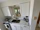 Bright kitchen with stainless steel sink, dishwasher, and modern countertops at 265 E Canton Ave # Ge, Winter Park, FL 32789