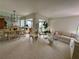 Open living area with large windows, dining space, and comfortable seating at 265 E Canton Ave # Ge, Winter Park, FL 32789