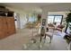 The living room provides balcony access and a formal dining area at 265 E Canton Ave # Ge, Winter Park, FL 32789