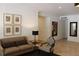Cozy living room featuring stylish seating, neutral tones, and tasteful art pieces at 265 E Canton Ave # Ge, Winter Park, FL 32789