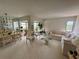 Bright and airy living room with ample seating and views from large windows at 265 E Canton Ave # Ge, Winter Park, FL 32789
