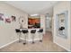 Kitchen featuring barstool seating and modern appliances at 2736 Oakwater Dr, Kissimmee, FL 34747