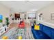 Open-concept living space with a view of the kitchen, dining area, and comfortable furniture at 2736 Oakwater Dr, Kissimmee, FL 34747
