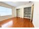 Bedroom with hardwood floors and an abundance of closet space at 2810 Elizabeth Ave, Orlando, FL 32804