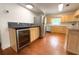 Spacious kitchen with wine cooler, ample counter space and hardwood flooring at 2810 Elizabeth Ave, Orlando, FL 32804