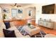 Bright living room features hardwood floors and a seamless flow to other living spaces at 2810 Elizabeth Ave, Orlando, FL 32804
