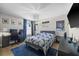 Cozy bedroom with a comfortable bed, work desk, and Star Wars decor at 2821 Columbus Ave, Clermont, FL 34715