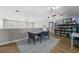 Versatile bonus room featuring a study area, table, and carpet at 2821 Columbus Ave, Clermont, FL 34715