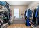 Spacious walk-in closet with ample shelving and hanging space for clothing and accessories at 2821 Columbus Ave, Clermont, FL 34715
