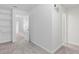 Bright bedroom features neutral carpet and an open doorway to walk-in closet at 2901 Harvest Hill Ln, Orlando, FL 32824
