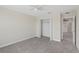 Bedroom features neutral carpet, a ceiling fan, and closet at 2901 Harvest Hill Ln, Orlando, FL 32824