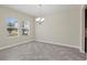 Dining room featuring tile flooring, white walls, and a chandelier at 2901 Harvest Hill Ln, Orlando, FL 32824