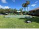Community playground with swings and room for to play at 2901 Harvest Hill Ln, Orlando, FL 32824