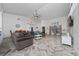 Spacious living room boasts high ceilings, modern flooring, and ample natural light at 2902 Paddington Way, Kissimmee, FL 34747