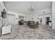 Bright and airy living room showcases stylish flooring, comfortable seating, and an open layout at 2902 Paddington Way, Kissimmee, FL 34747