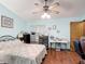 Comfortable bedroom features ceiling fan, and ample space for rest and personalization at 3110 Short Leaf Pine Ct, Kissimmee, FL 34746